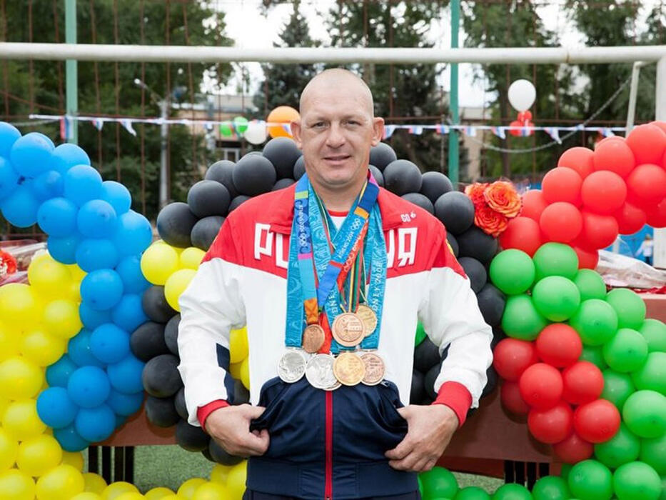 Дмитрий Саутин с олимпийскими медалями